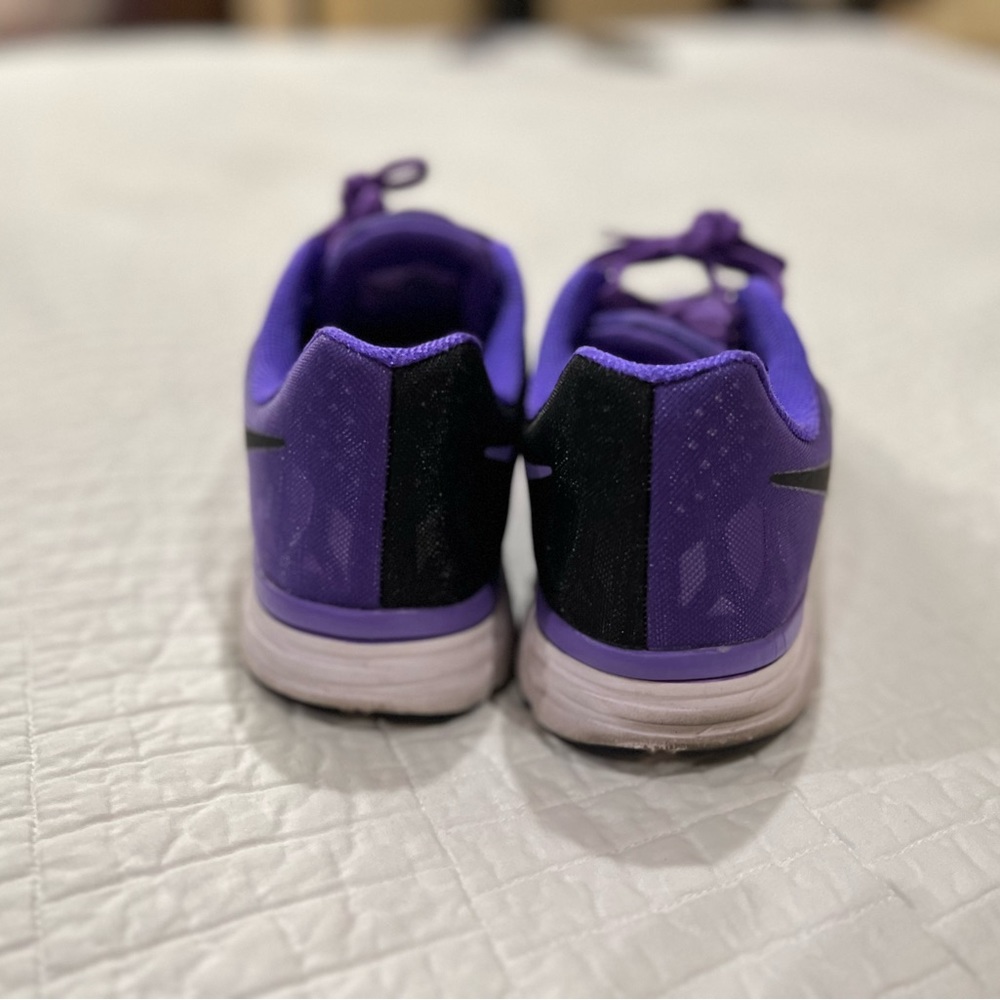 Purple with black and bright green tennis shoes